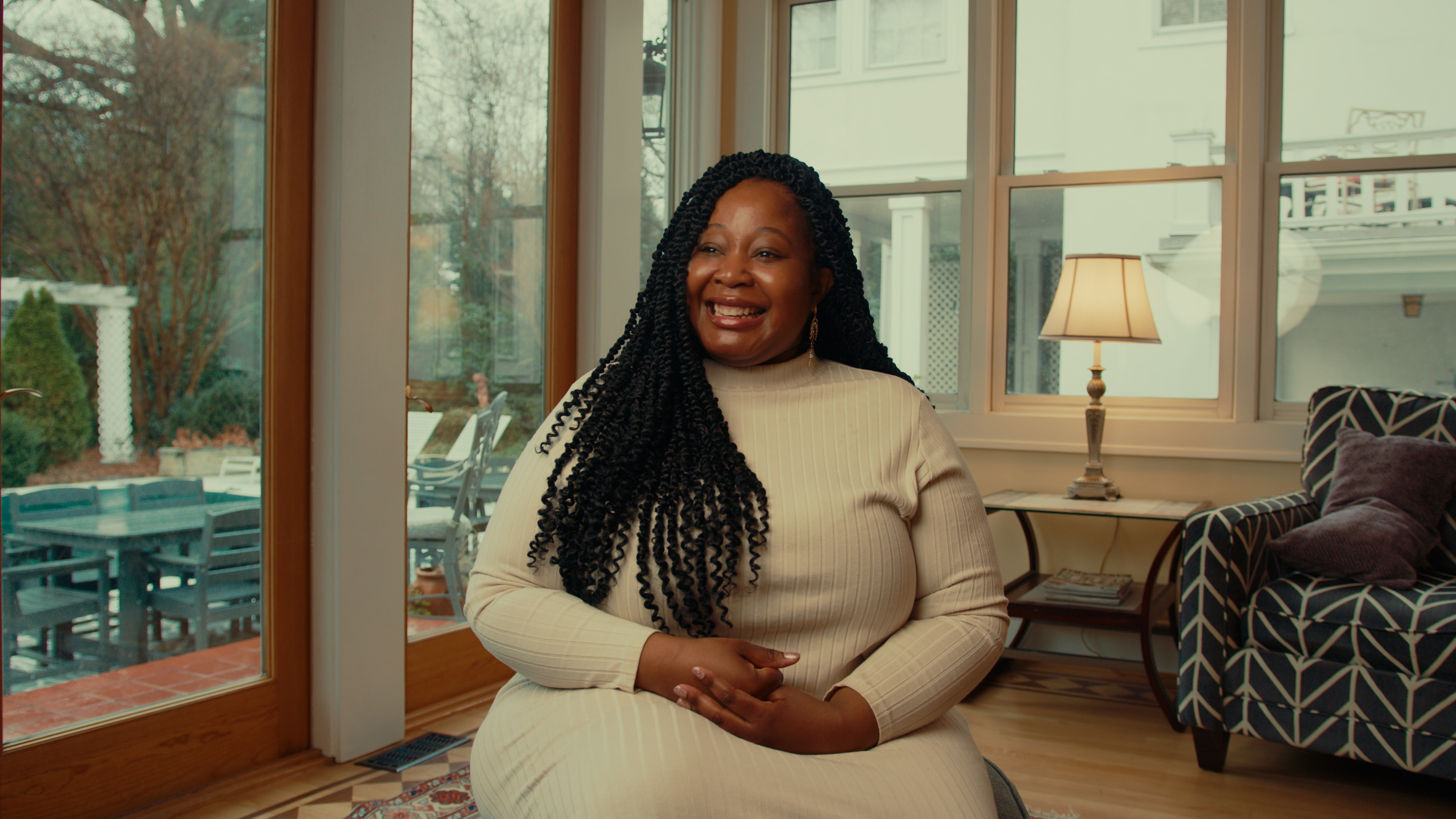 An Embla member smiling at home